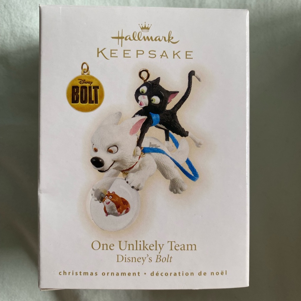 Hallmark keepsake ornament 2009 One Unlikely Team!! 🤩💗💕